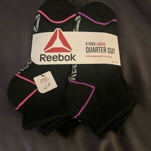 Reebok Black and various colors trimmed  
Ladies Athletic Socks.